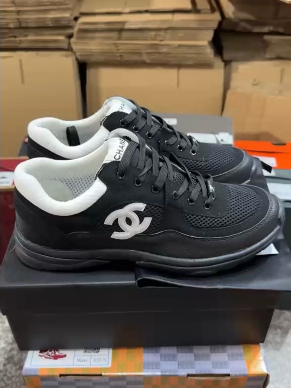 CHANEL Black & White Men’s Low-Top Sneakers with CC Logo